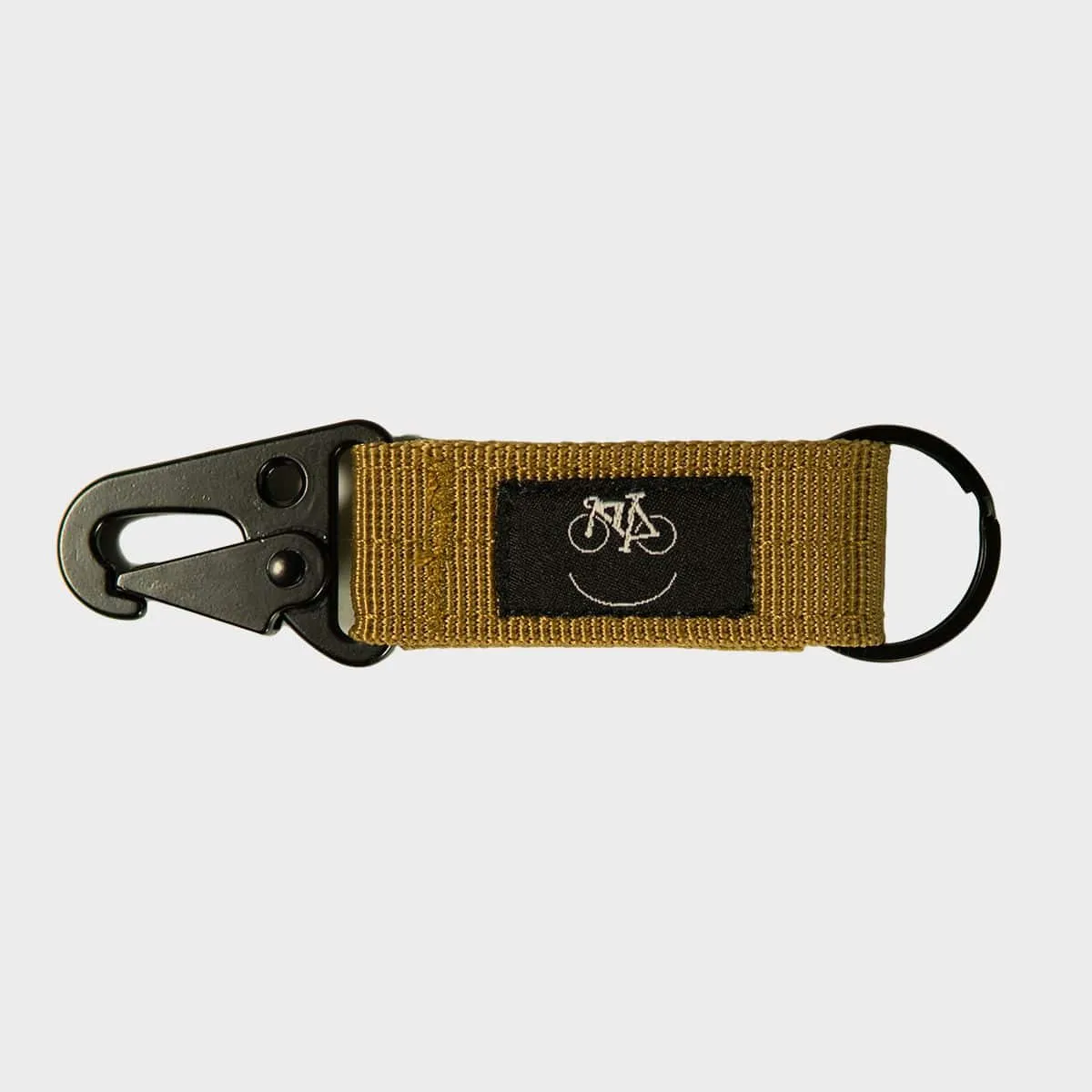 Chela Clo – Llavero con Gancho y velcro para cinturón khaki