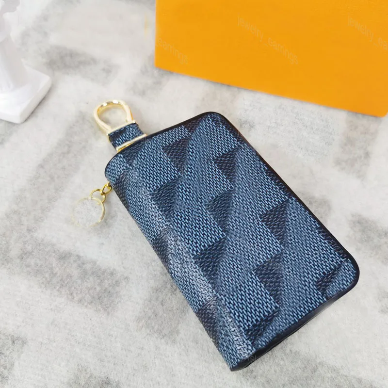 Diseñador de moda Pu Llaveros Llavero Hombres Mujeres Bolsas Colgante Hebilla Llavero Coche Colgante de cuero hecho a mano Llave