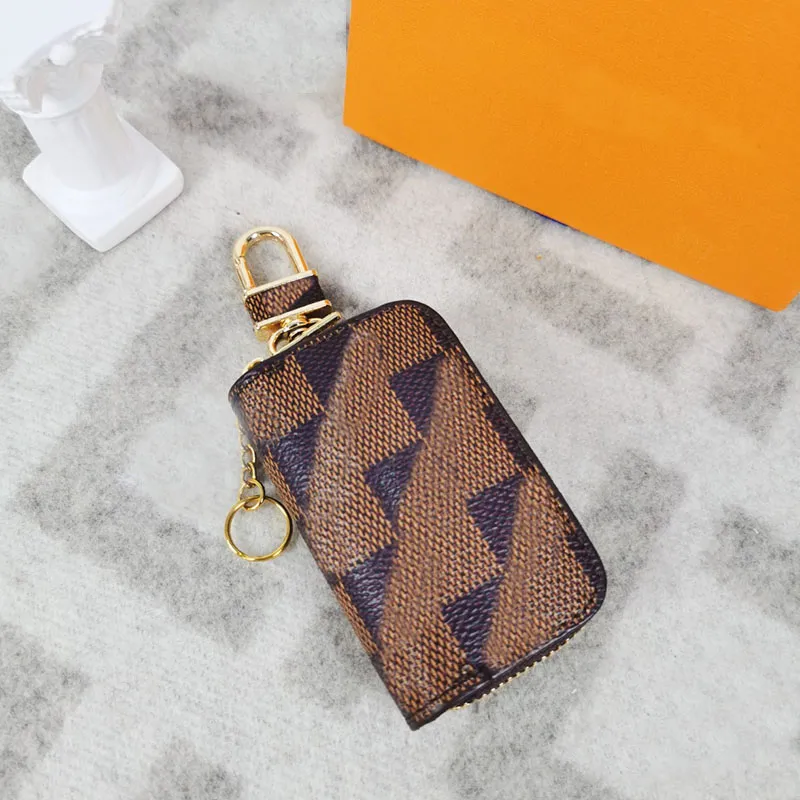 Diseñador de moda Pu Llaveros Llavero Hombres Mujeres Bolsas Colgante Hebilla Llavero Coche Colgante de cuero hecho a mano Llave