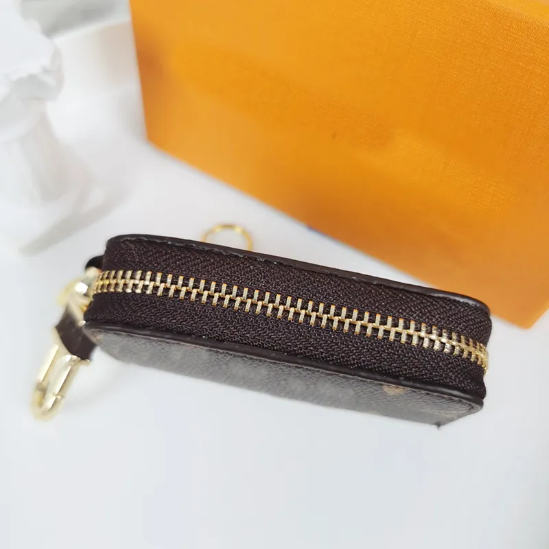 Diseñador de moda Pu Llaveros Llavero Hombres Mujeres Bolsas Colgante Hebilla Llavero Coche Colgante de cuero hecho a mano Llave