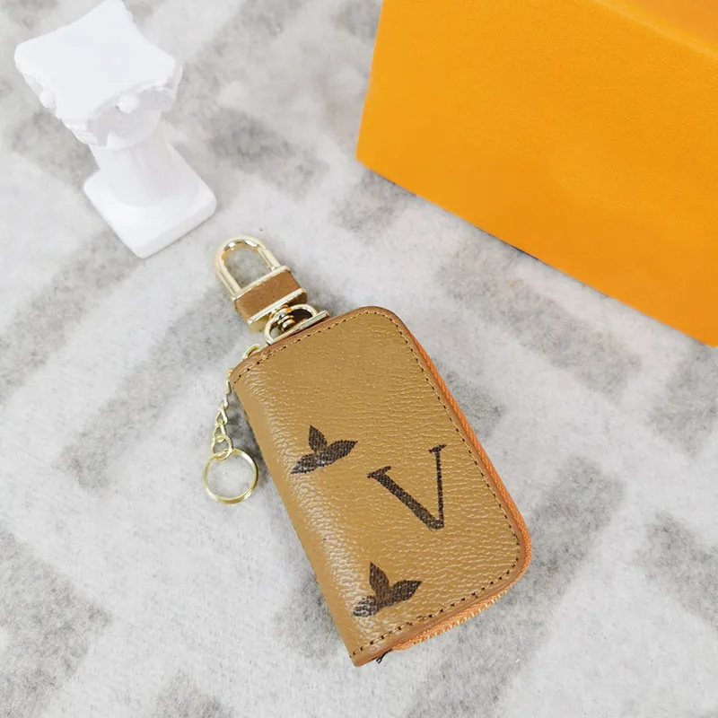 Diseñador de moda Pu Llaveros Llavero Hombres Mujeres Bolsas Colgante Hebilla Llavero Coche Colgante de cuero hecho a mano Llave
