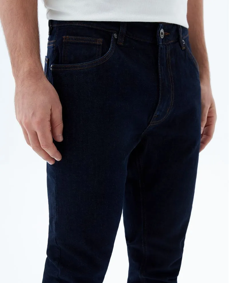 Jean Tapered fit cinco bolsillos para hombre