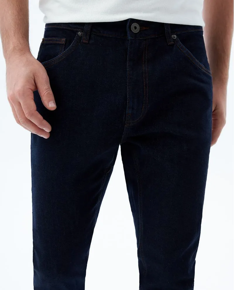 Jean Tapered fit cinco bolsillos para hombre