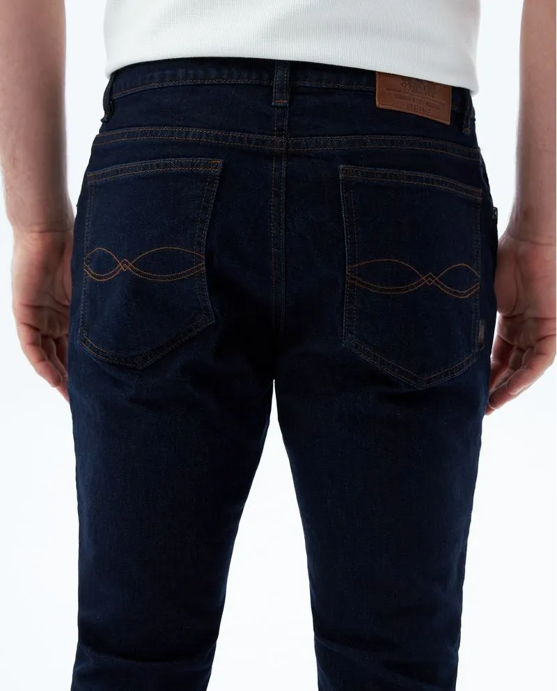 Jean Tapered fit cinco bolsillos para hombre