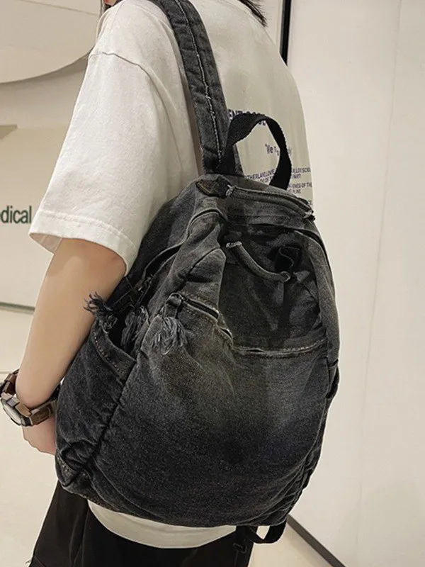 Mochila vaquera con lavado vintage degradado
