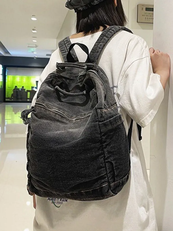 Mochila vaquera con lavado vintage degradado
