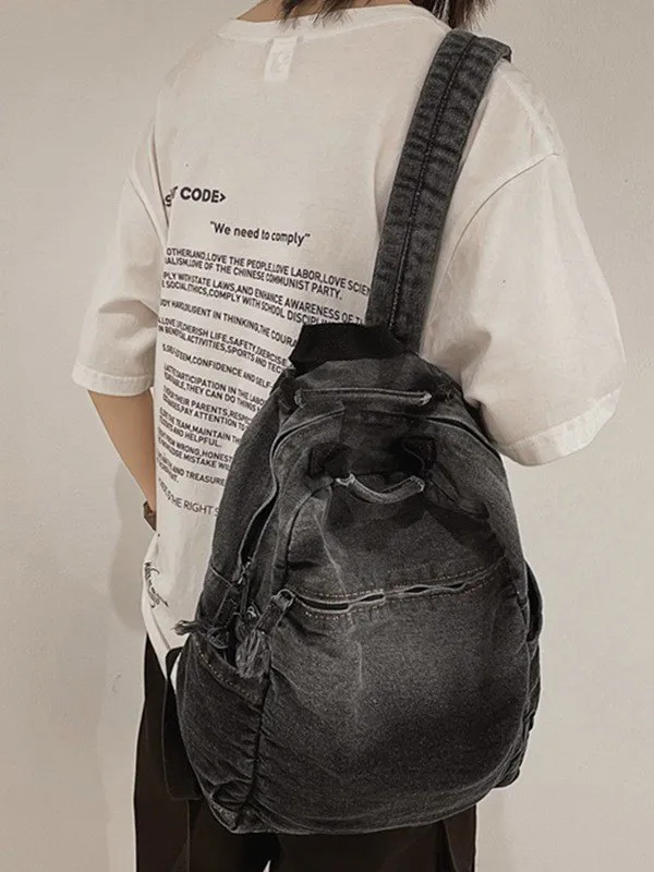 Mochila vaquera con lavado vintage degradado