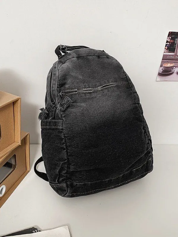 Mochila vaquera con lavado vintage degradado