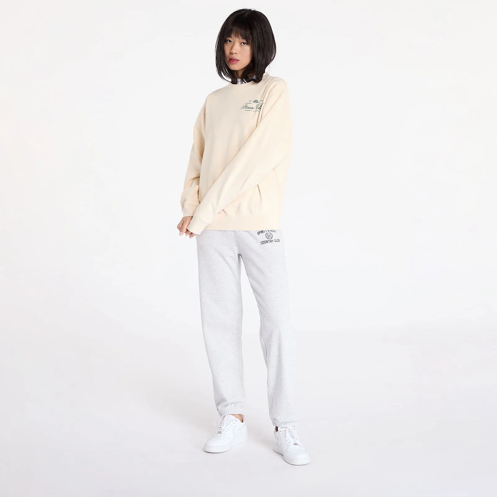 Sporty & Rich Fitness World Crewneck UNISEX Cream/ Alpine XS