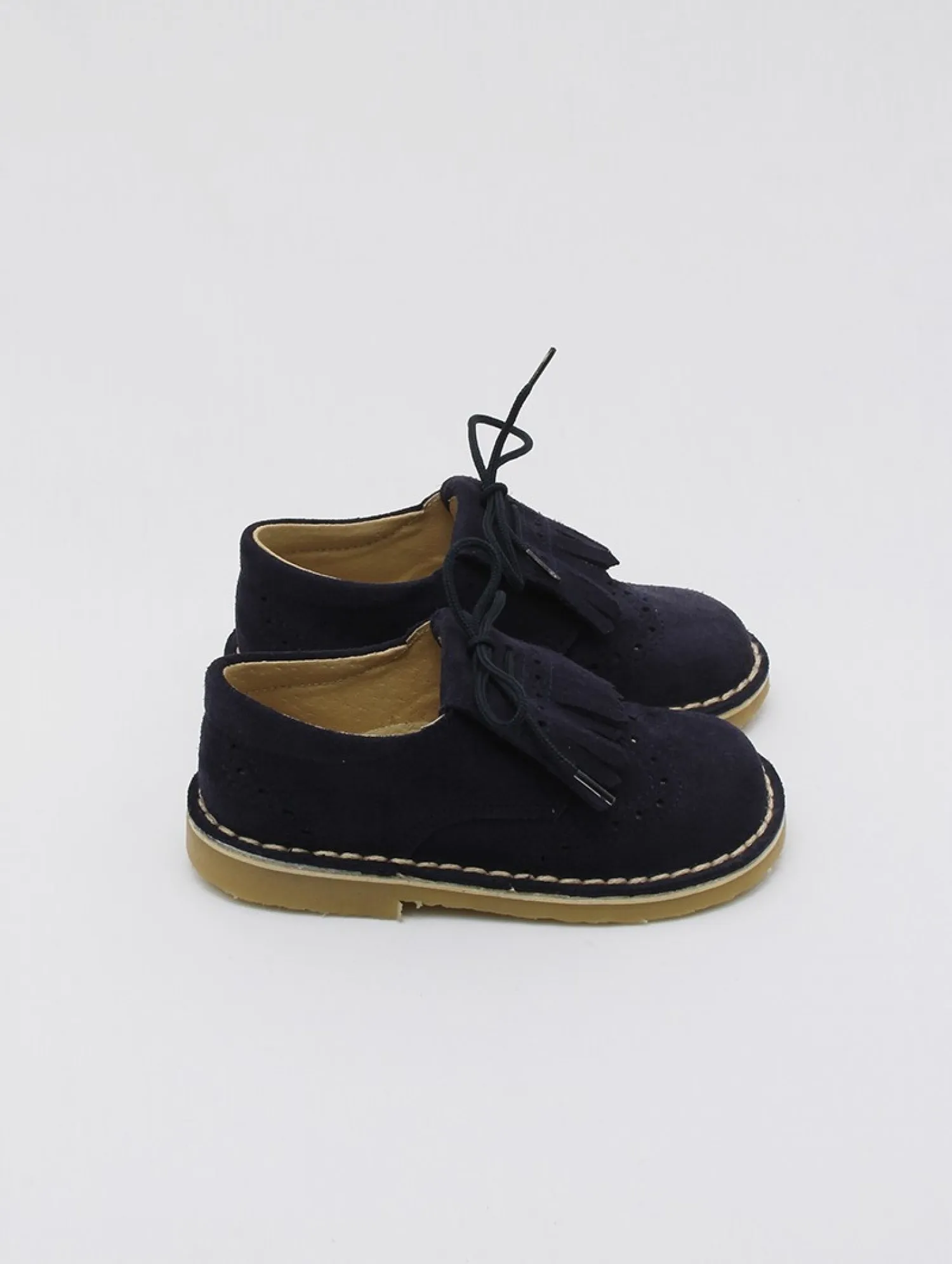 ZAPATO CLáSICO CON LENGüETAS UNISEX. COLOR MARINO. OINVIERNO